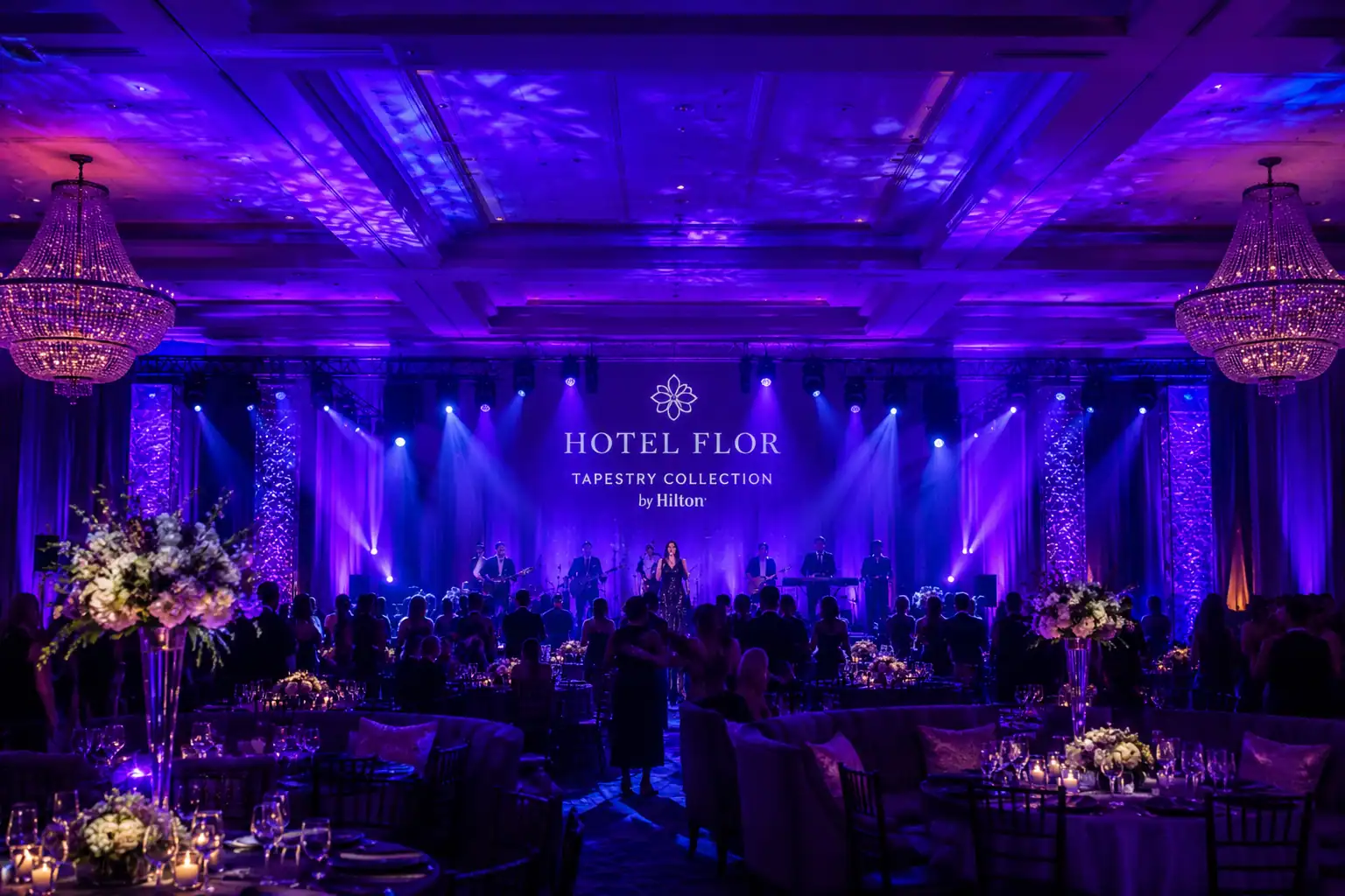 Luxury Orlando ballroom transformed with corporate event lighting, stage lighting and uplighting by TYLERLIGHT
