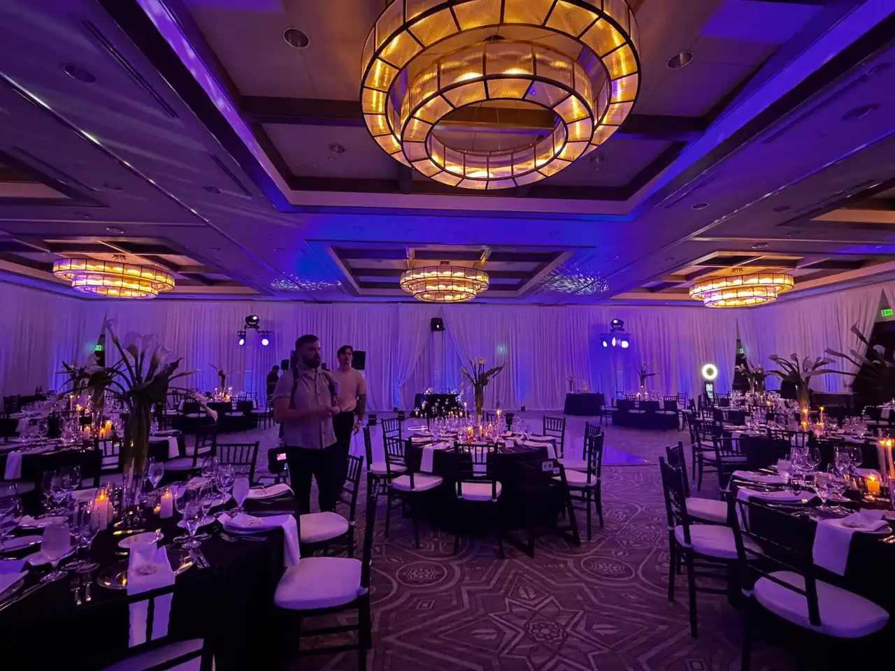 Orlando ballroom wedding with purple event lighting and custom projection