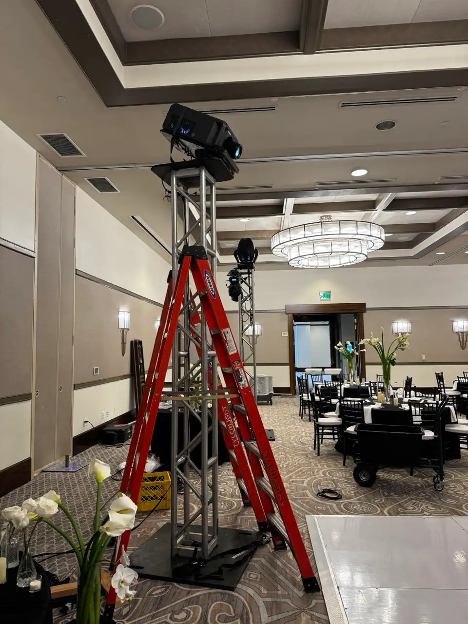 Wedding monogram projector mounted on a truss tower for an Orlando wedding