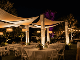 Professional outdoor event lighting installation for an Orlando special event featuring architectural lighting, custom canopy lighting, and elegant string lights.
