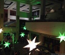 Illuminated air-filled star lighting installed throughout an Orlando event venue