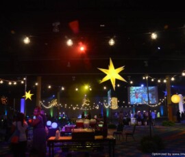 Illuminated air-filled stars creating visual impact inside a large Orlando event venue