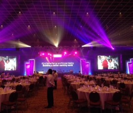 Purple stage and production lighting for a large corporate conference in Orlando