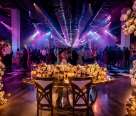 Luxury wedding reception with elegant floral décor, custom dance floor lighting, laser effects, and premium event lighting by TYLERLIGHT in Orlando, Florida.