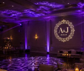 Custom GOBO logo projection lighting illuminating an elegant Orlando event venue